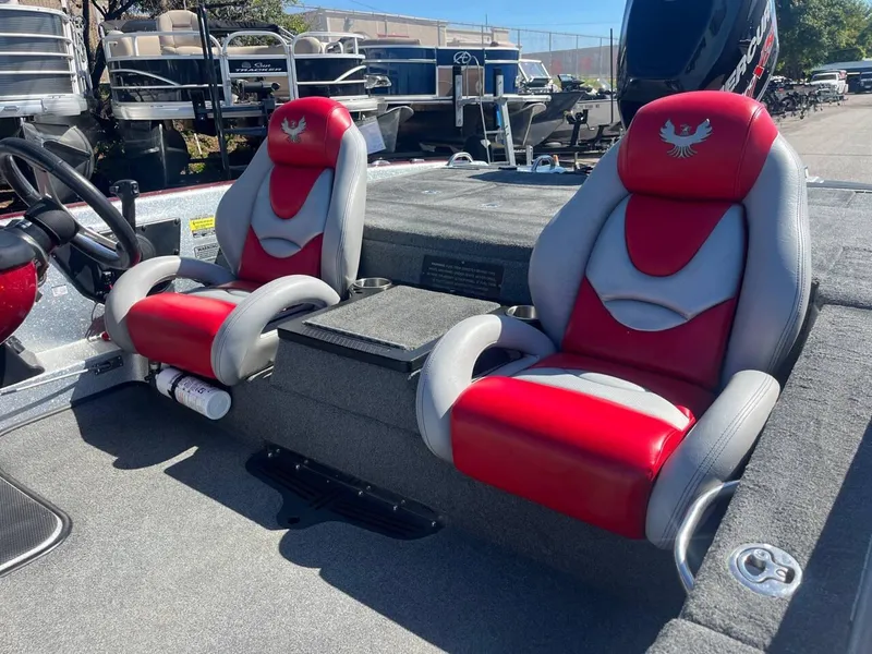Slide: The Image of 2015 Phoenix 819 Pro boat interior with red and gray seats. - 10