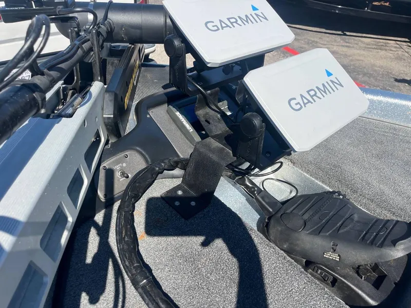 Slide: The Image of Garmin navigation system on 2015 Phoenix 819 Pro boat deck. - 31