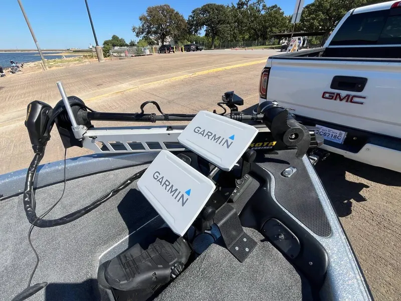 Slide: The Image of 2015 Phoenix 819 Pro boat with Garmin electronics near a GMC truck. - 37