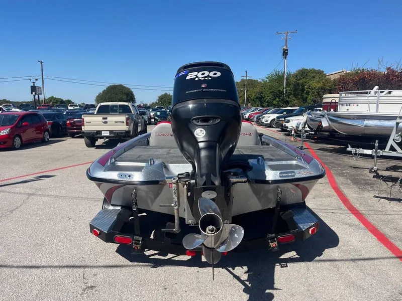 Slide: The Image of 2015 Phoenix 819 Pro boat with 200 HP engine in parking lot. - 47