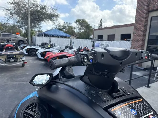 Slide: The Image of 2025 Yamaha Marine Waverunner FX SVHO dashboard with audio system, black and cyan design. - 7