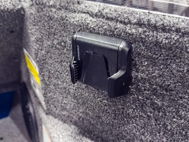 Slide: The Image of 2025 Lund 1775 Adventure Sport interior detail with mounted accessory holder. - 11