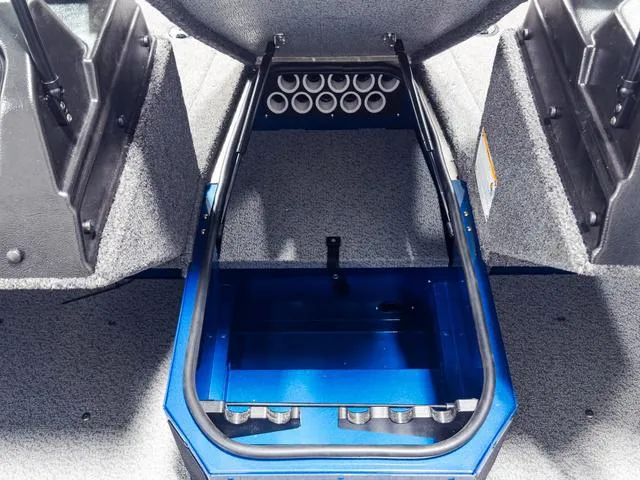 Slide: The Image of Interior of 2025 Lund 1775 Adventure Sport boat, featuring storage compartments and rod holders. - 16