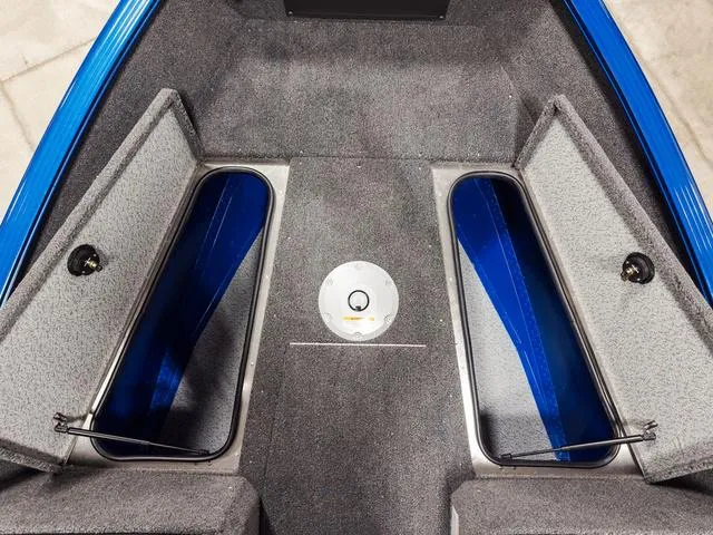 Slide: The Image of 2025 Lund 1775 Adventure Sport boat interior with open storage compartments. - 17