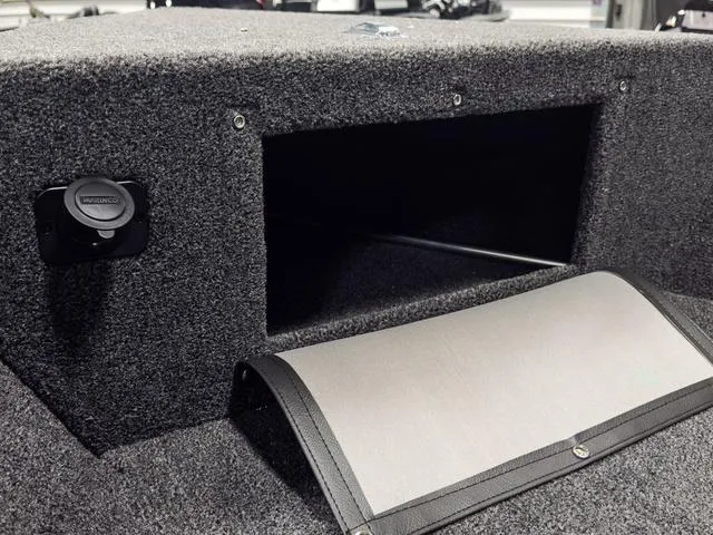 Slide: The Image of 2025 Lund 1775 Adventure Sport boat interior storage compartment. - 18