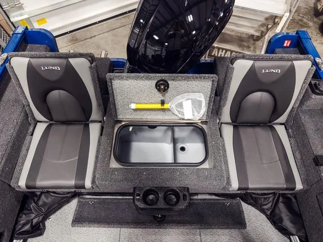 Slide: The Image of 2025 Lund 1775 Adventure Sport boat interior with seating and storage compartments. - 4