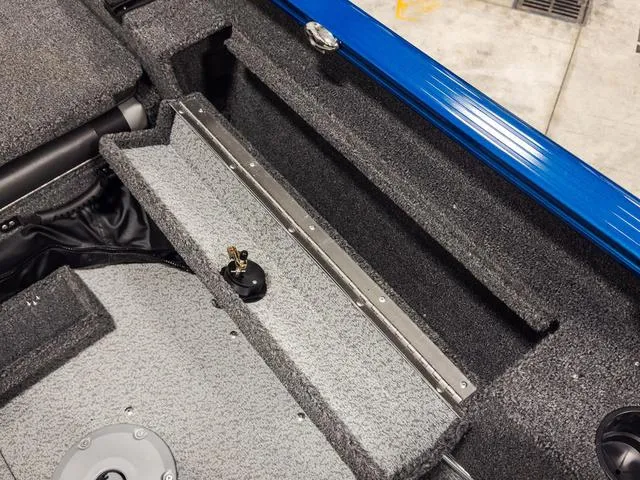 Slide: The Image of Interior view of 2025 Lund 1775 Adventure Sport boat, featuring storage compartments. - 6