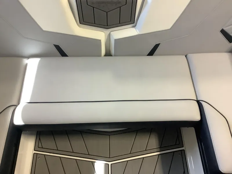Slide: The Image of 2025 Nautique GS22 interior seating with sleek, modern design and premium materials. - 20