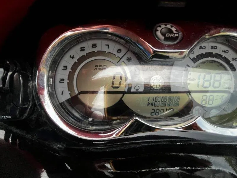 Slide: The Image of Close-up of 2011 Sea-Doo RXP 255 dashboard with speedometer and RPM gauge. - 10