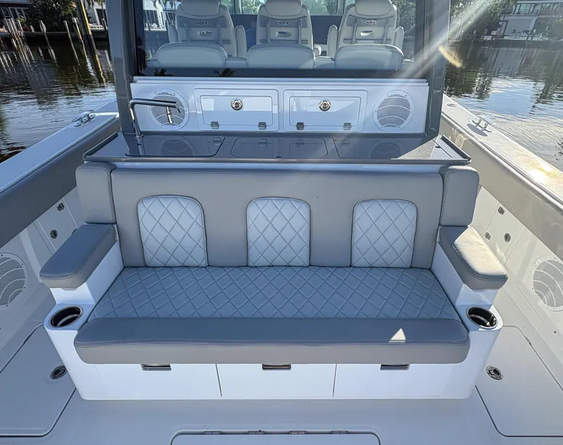 Slide: The Image of 2023 HCB 53 Sueños boat interior with luxurious seating and modern design. - 14