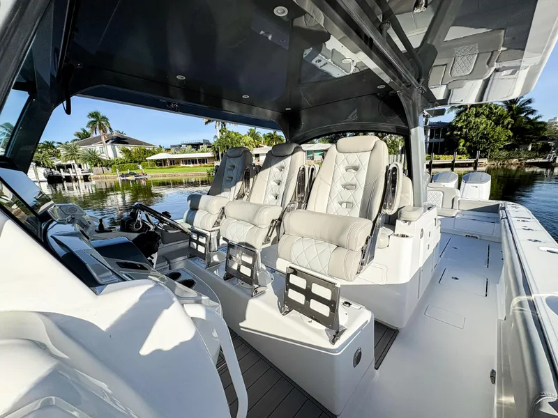 Slide: The Image of 2023 HCB 53 Sueños luxury boat interior with plush seating and modern design. - 24