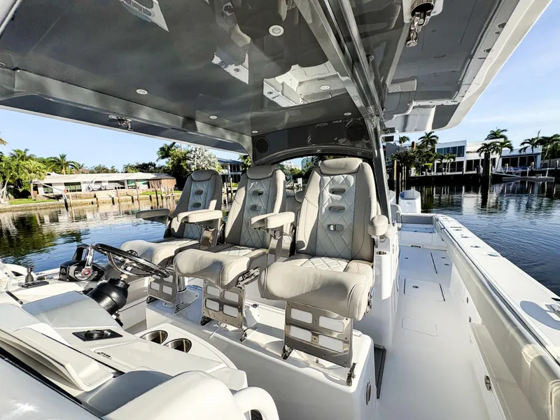 Slide: The Image of Luxurious interior of 2023 HCB 53 Sueños boat with plush seating and sleek design. - 26