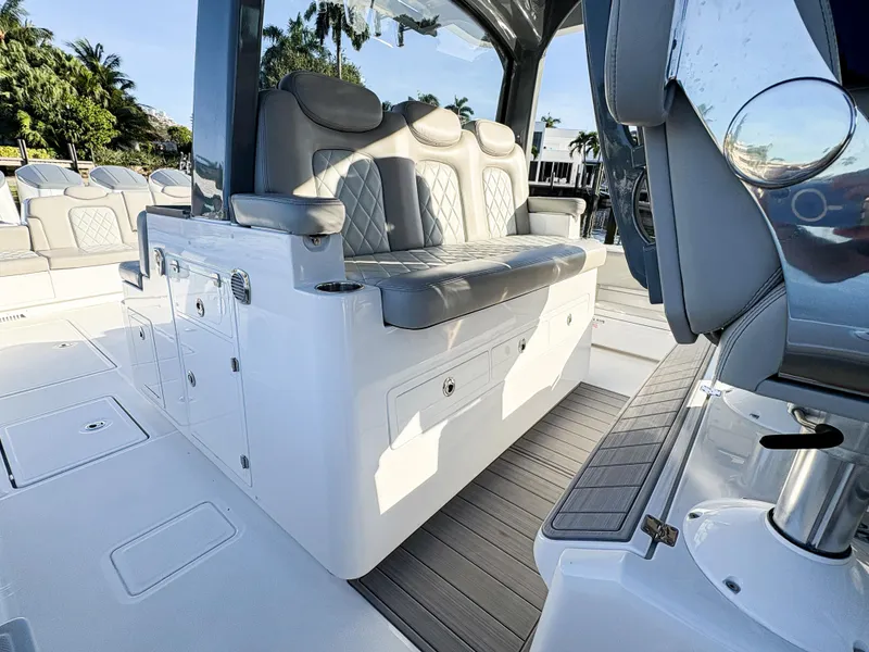 Slide: The Image of 2023 HCB 53 Sueños boat interior with luxurious seating and modern design. - 30