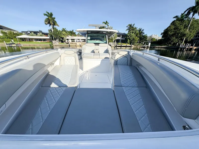 Slide: The Image of 2023 HCB 53 Sueños luxury boat with spacious seating and sleek design. - 31