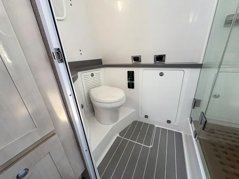 Slide: The Image of 2023 HCB 53 Sueños boat bathroom with modern fixtures and sleek design. - 48