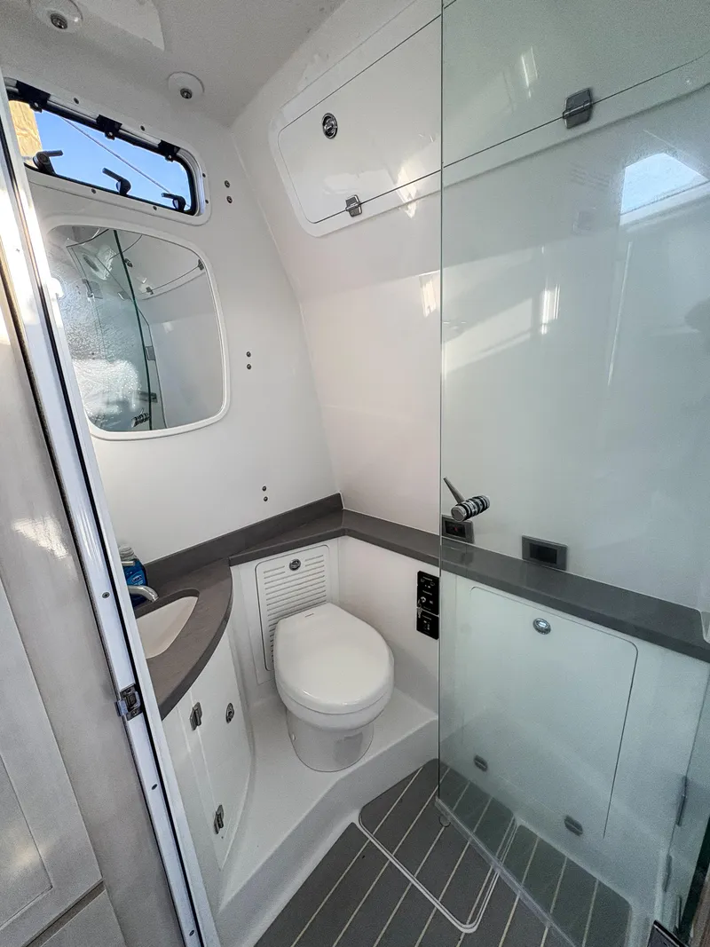 Slide: The Image of Modern bathroom in 2023 HCB 53 Sueños boat with sleek design and glass shower. - 49