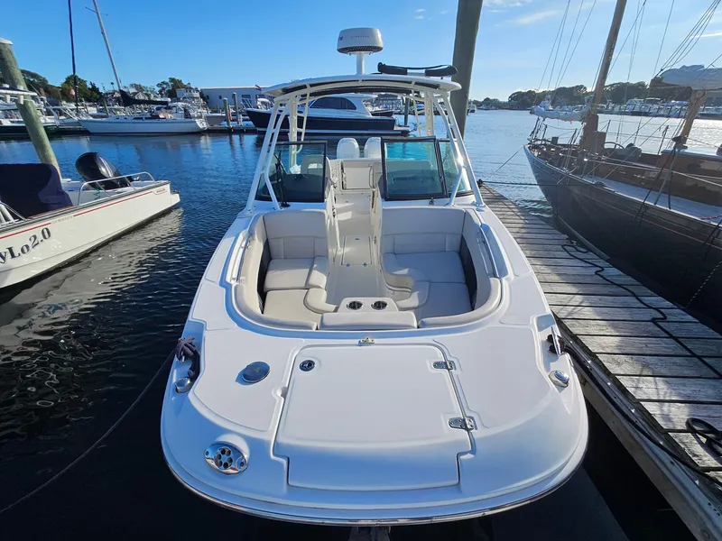 Slide: The Image of 2018 Boston Whaler 270 Vantage docked at marina, front view. - 3