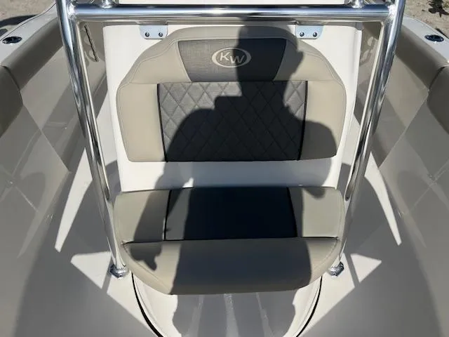 Slide: The Image of 2025 Key West 203 FS boat seat with KW logo and shadow. - 11