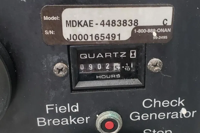 Slide: The Image of Hour meter on Tiara Yachts 2001 52 Express Cruiser, showing 9025 hours. - 19