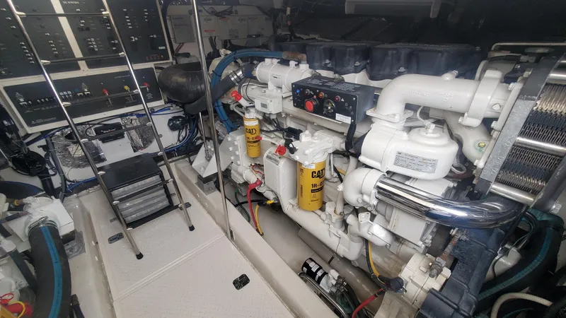 Slide: The Image of Engine room of 2001 Tiara Yachts 52 Express Cruiser with Caterpillar engines. - 23