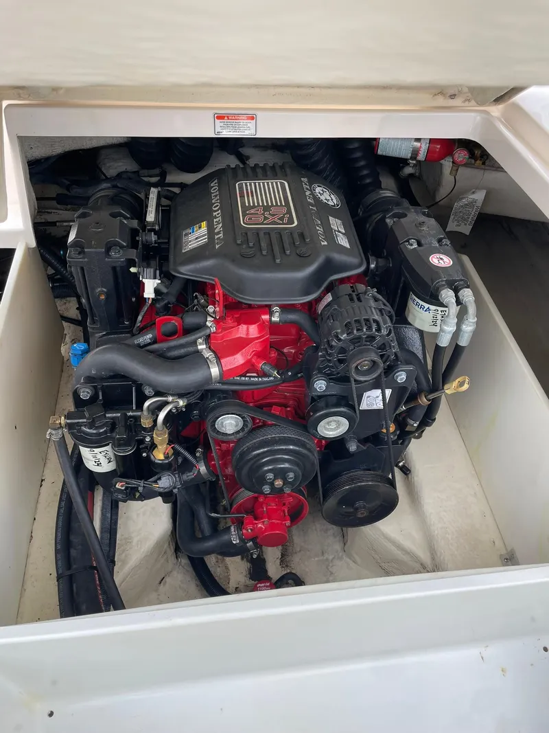 Slide: The Image of 2006 Regal 2000 Bowrider engine compartment with visible components. - 13