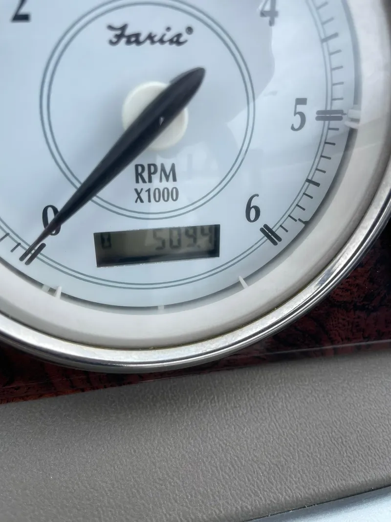 Slide: The Image of Close-up of Faria RPM gauge on 2006 Regal 2000 Bowrider, showing 5094 RPM. - 16