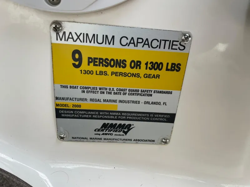 Slide: The Image of Capacity label for 2006 Regal 2000 Bowrider: 9 persons or 1300 lbs. - 19
