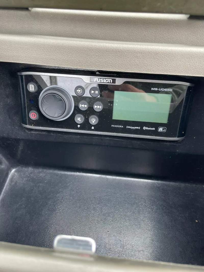 Slide: The Image of Fusion marine stereo in 2006 Regal 2000 Bowrider boat dashboard. - 20