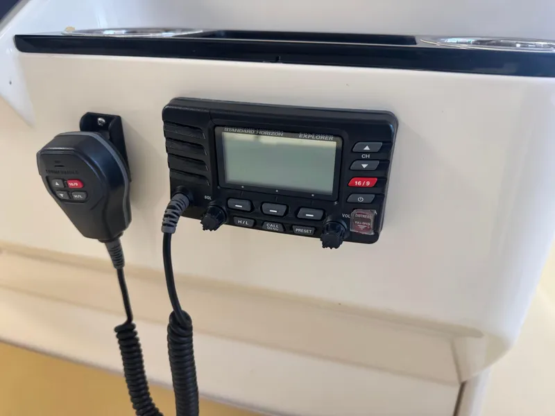 Slide: The Image of VHF radio system on 2019 Scout 235 XSF boat dashboard. - 12