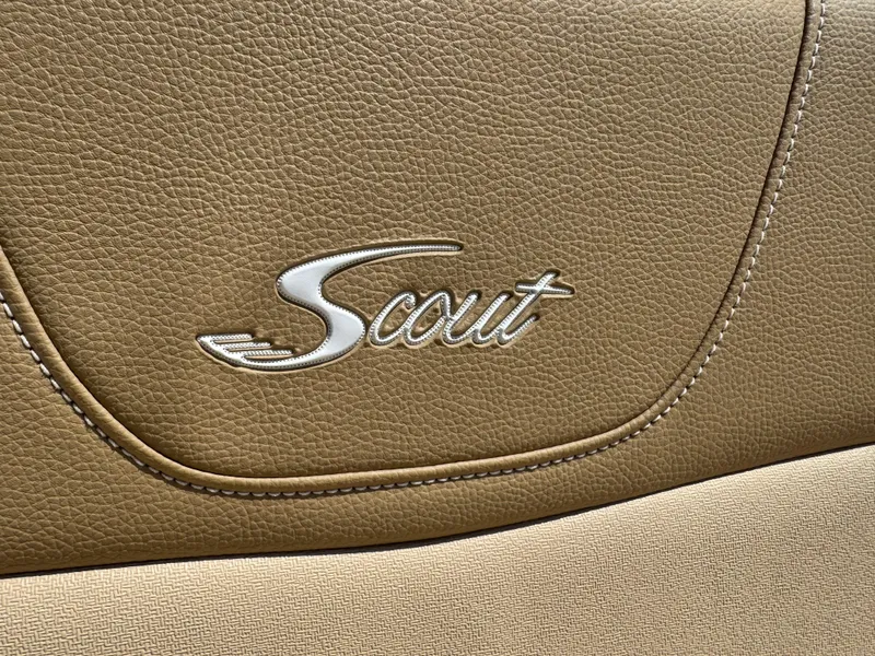 Slide: The Image of Scout 235 XSF 2019 logo on tan leather upholstery. - 33
