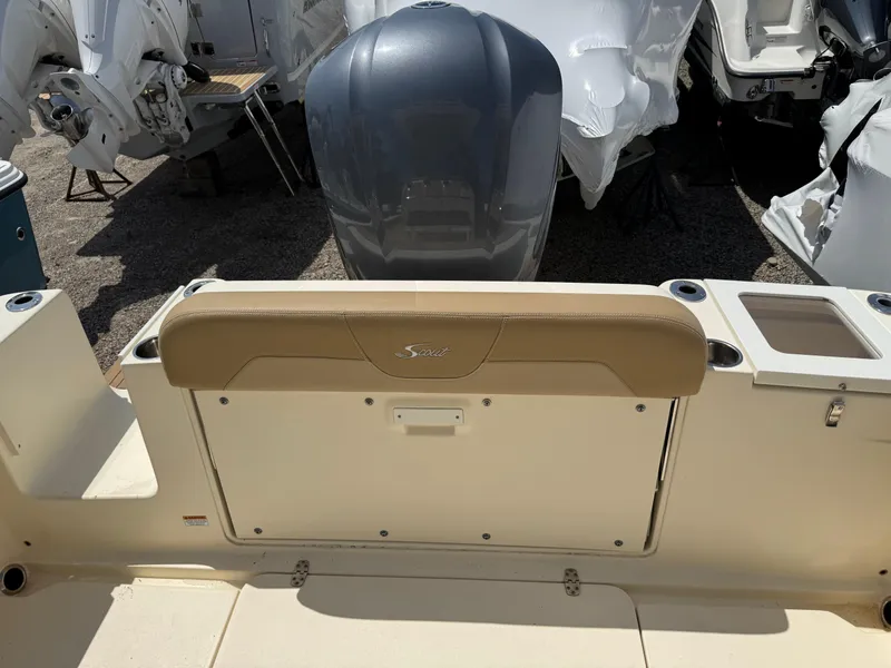 Slide: The Image of 2019 Scout 235 XSF boat interior with seating and engine view. - 45