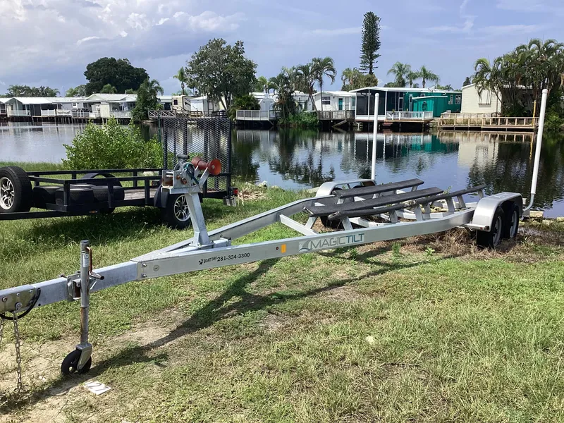 Slide: The Image of Boat trailer near waterfront homes, suitable for 2017 Stingray 234 LR. - 46