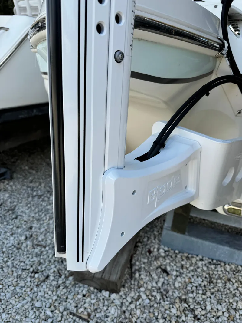 Slide: The Image of 2017 Stingray 234 LR boat detail, white exterior, close-up of hardware and wiring. - 6