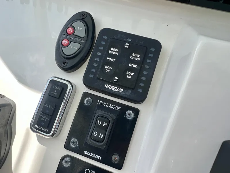 Slide: The Image of Control panel of a 2021 Sea Born LX24 boat with Suzuki components. - 15