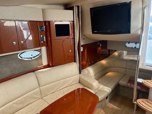 Slide: The Image of Luxurious 2011 Formula 34 PC yacht interior with leather seating and wood accents. - 16