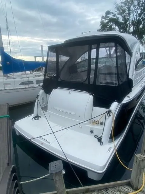Slide: The Image of 2011 Formula 34 PC yacht docked at marina, rear view with canopy. - 5