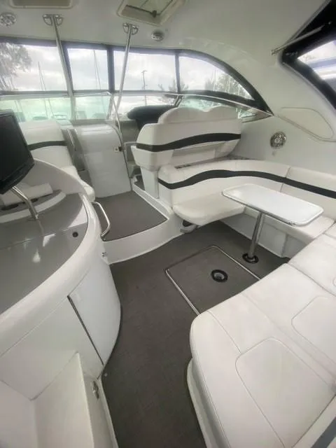 Slide: The Image of 2011 Formula 34 PC yacht interior with white seating and modern design. - 6