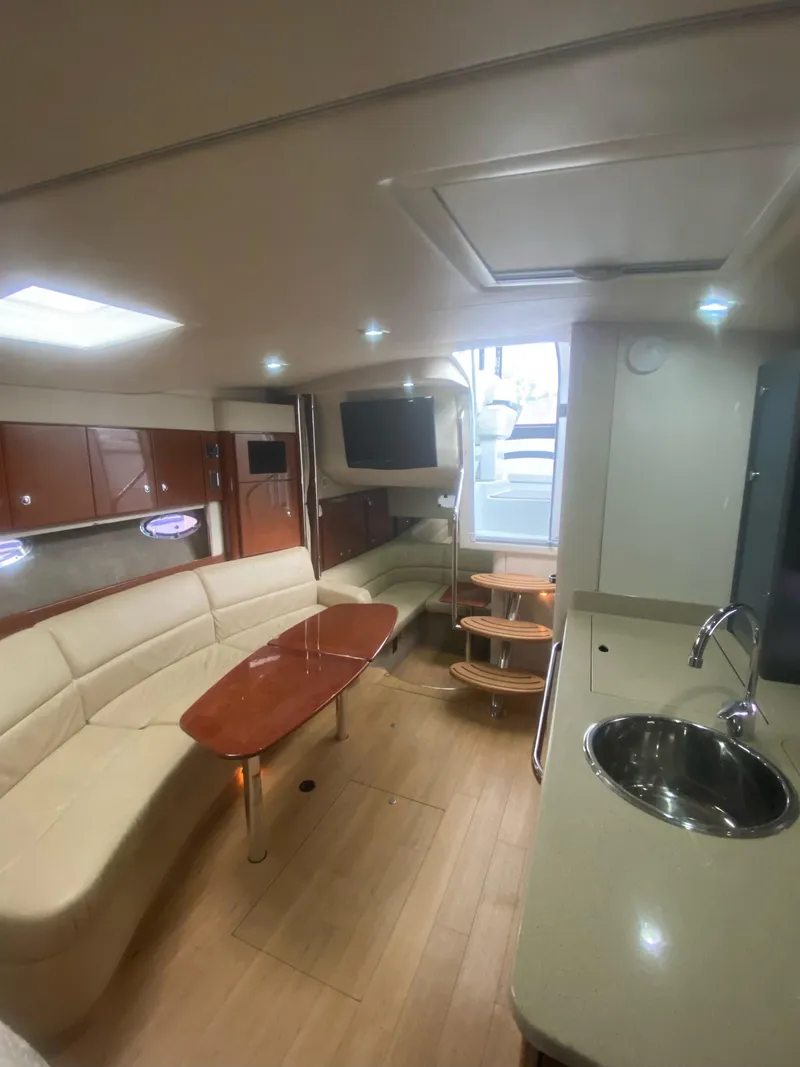 Slide: The Image of Luxurious interior of 2011 Formula 34 PC yacht with modern amenities and elegant design. - 7