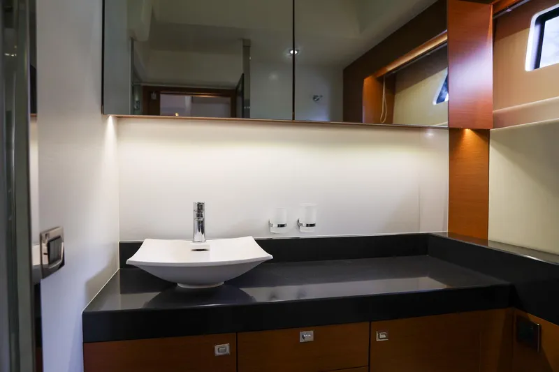 Slide: The Image of Luxurious bathroom interior of 2015 Prestige 520 yacht with modern sink and sleek design. - 15