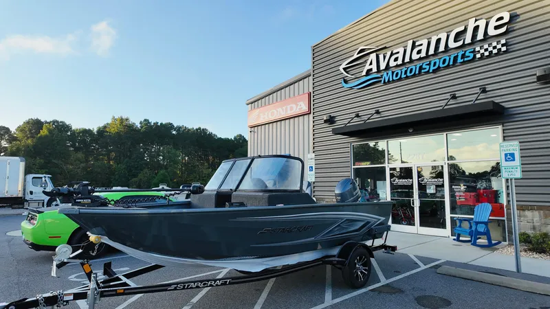 Slide: The Image of 2025 Starcraft Storm 166 DC Pro boat displayed at Avalanche Motorsports dealership. - 3