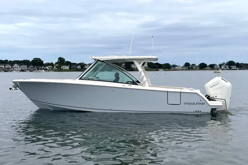 The Image of 2025 Sailfish 316 DC boat on calm water, side view. - 1