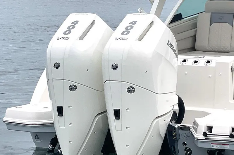 Slide: The Image of Twin Mercury 400 V10 outboard engines on a 2025 Sailfish 316 DC boat. - 3