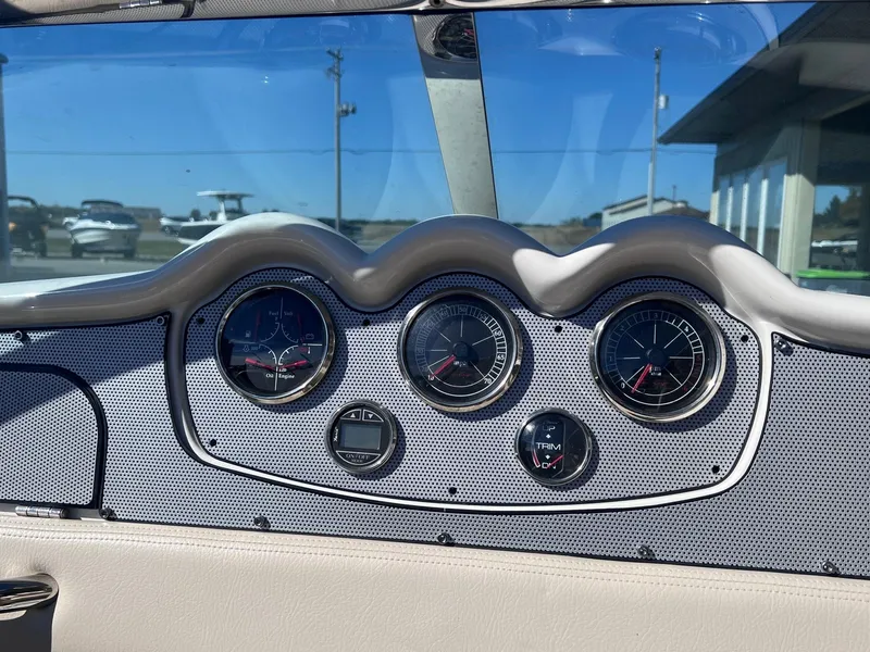 Slide: The Image of Dashboard of a 2005 Chris-Craft Speedster boat with classic gauges. - 15