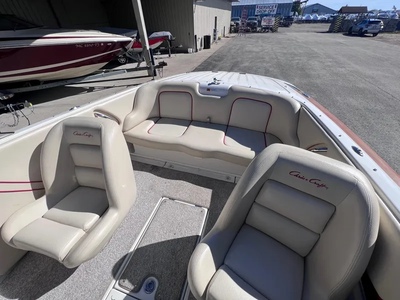 Slide: The Image of 2005 Chris-Craft Speedster boat interior with beige leather seats. - 17
