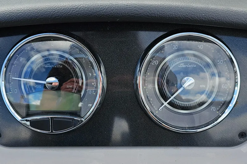 Slide: The Image of Dashboard of 2025 Barletta A22UC with speedometer and tachometer gauges. - 10