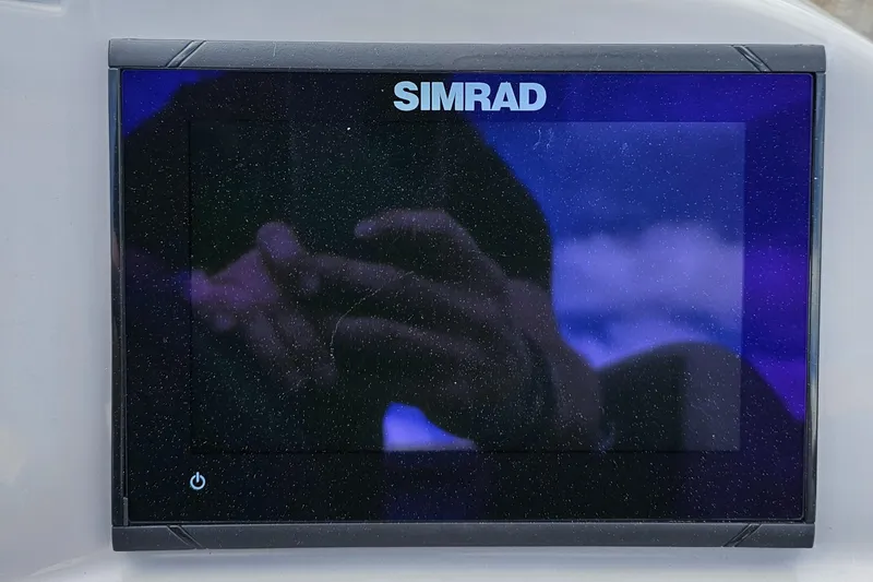 Slide: The Image of Simrad display screen on Barletta A22UC, 2025 model, showing reflection. - 11