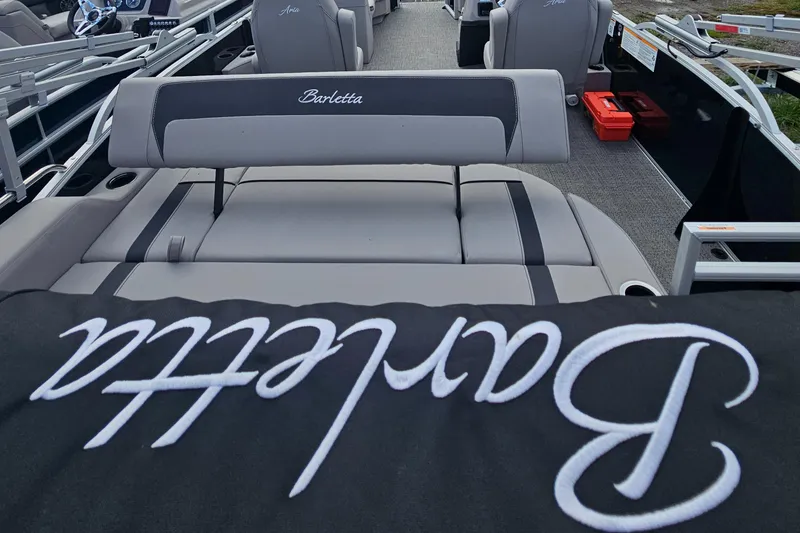 Slide: The Image of 2025 Barletta A22UC boat interior with branded seating and sleek design. - 18