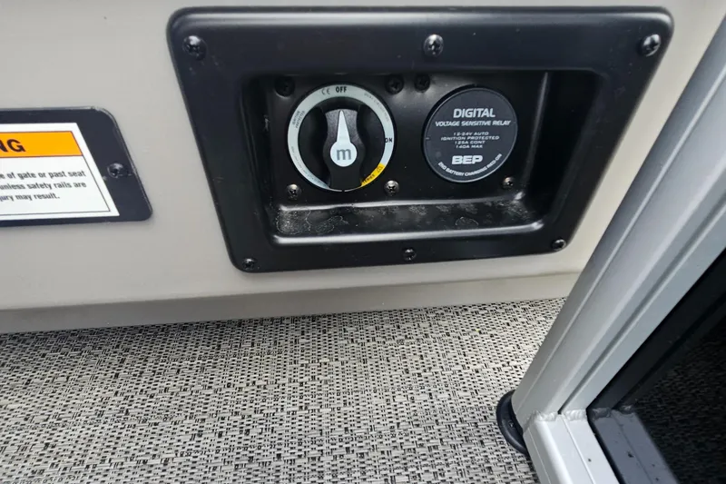 Slide: The Image of Control panel of a 2025 Barletta A22UC boat with digital voltage sensing relay. - 19