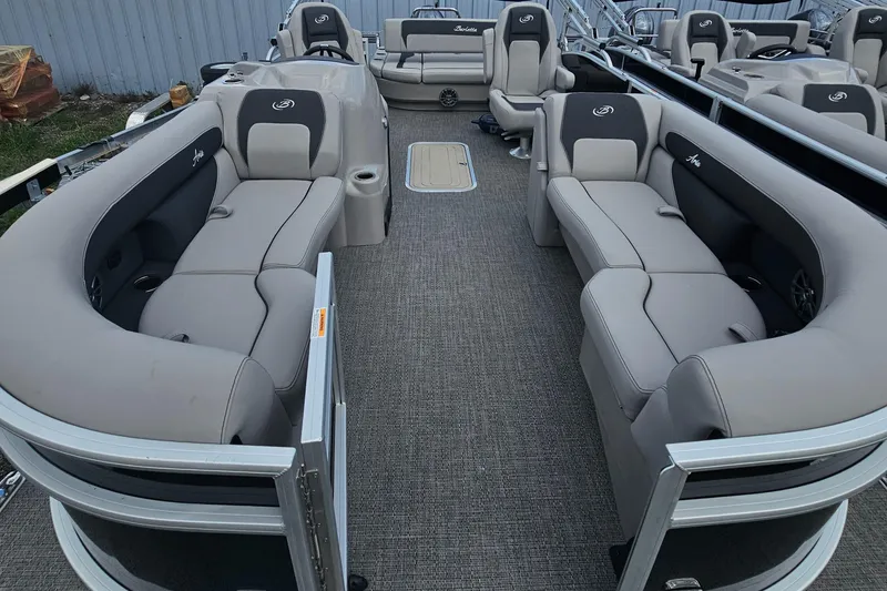 Slide: The Image of 2025 Barletta A22UC pontoon boat with spacious seating and modern design. - 3