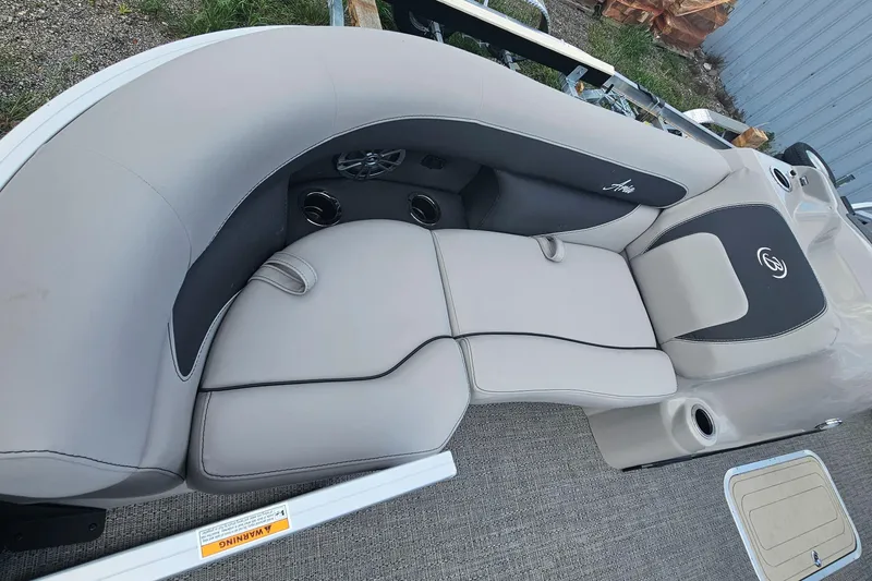 Slide: The Image of 2025 Barletta A22UC boat interior with luxurious seating and modern design. - 4